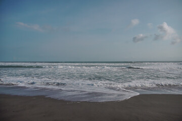 Soft wave of blue ocean on jogja beach. Background