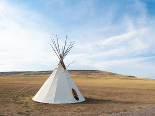 Tipi on the Grounds of the First Peoples Buffalo Jump State Park in Montana - obrazy, fototapety, plakaty