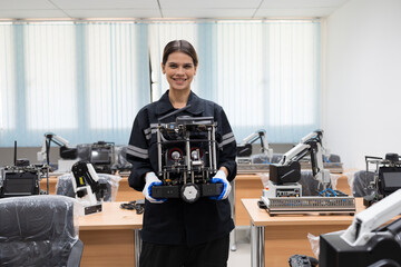Portrait of female engineers holding AI Robot and Artificial Intelligence of Things service robot...