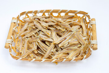 Dried anchovy on white background.