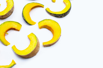 Green pumpkin pieces on white.