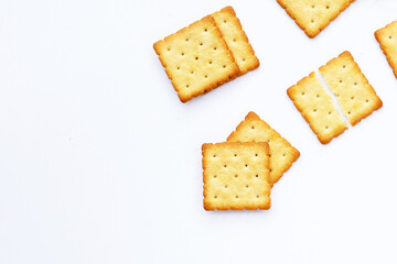 Dry cracker cookies on white background.
