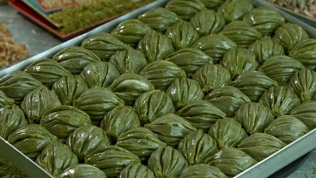 Traditional turkish baklava pistachio pastry. Dilberdudagi, ozel kesim baklava, cikolatali baklava, fistikli baklava, katmer, fistikli kadayif, kattafi, fistik sarma, soguk baklava, midye baklava, cev
