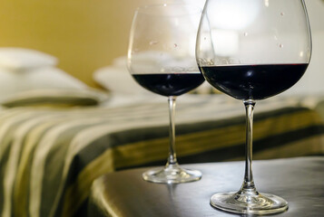 glasses of red wine in hotel room