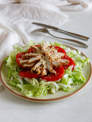Healthy Homemade Sesame Salad with Chicken Tomato and Chinese cabbage. Vertical