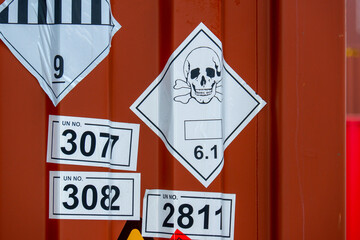 Dangerous stickers attached to containers