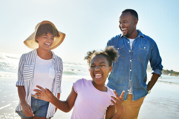 Beach, parents and portrait of African girl on holiday with a peace sign, crazy and funny in Australia. Comic, goofy and happy black family walking by the ocean to relax, travel and smile on vacation