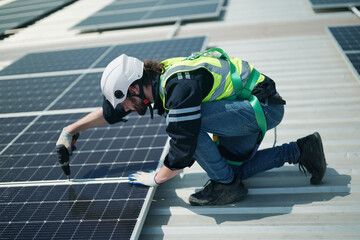 Professional worker installing solar panels on the roof. engineer working on checking equipment in solar power plant, Pure energy, Renewable energy.