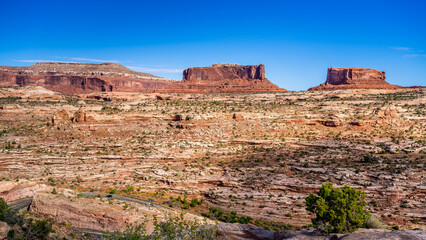 Fototapeta na wymiar Monitor and Merrimac Buttes along Highway 313 to Canyonlands National Park