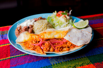 The fajita is one of the most traditional and popular dishes in Tex-Mex cuisine. It consists of meat roasted on the grill and cut into strips, served on a corn flour or wheat flour tortilla.