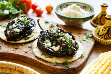 Black chile stuffed with cheese and huitlacoche.