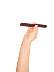 hand holds nail file, professional tool for manicure and pedicure,on white background,