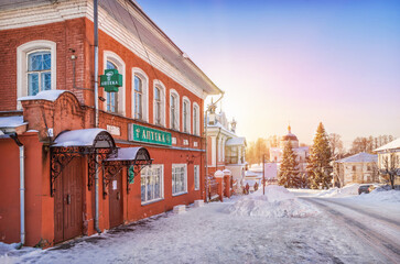 Fototapeta na wymiar Pharmacy building and Mouse Palace, Nikolskaya street, Myshkin city, Yaroslavl region. Caption: Pharmacy