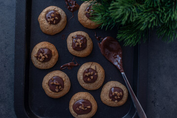 Fototapeta na wymiar sweet home made chocolate christmas cookies on a christmas table