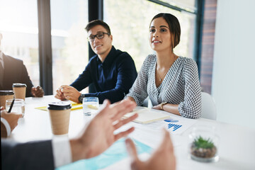 Business people, meeting and discussion for team planning, analysis or brainstorming ideas at the...