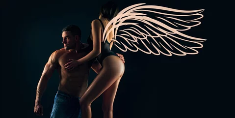 Angels couple, valentines day photo banner. Sexy couple. I Love You. Romantic and loving models. Intimate relationship and sexual relations. Dominant man. Passion and sensual touch. © Volodymyr