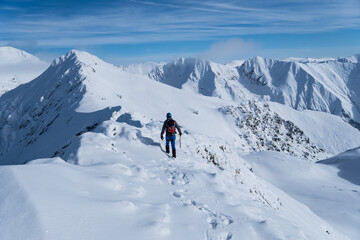 Fototapeta na wymiar skiing in the mountains, Paltinul Peak, Fagaras Mountains, Romania 