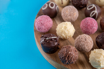 photo round chocolate candies on a round board