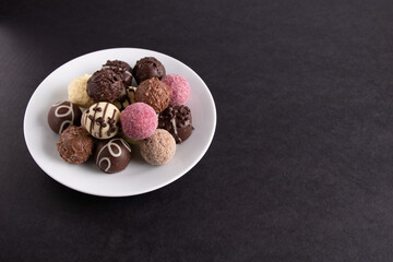 photo of lots of colorful chocolates on a plate