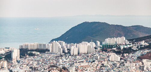 Fototapeta na wymiar Cityscape of Busan, modern residential houses and block of flats