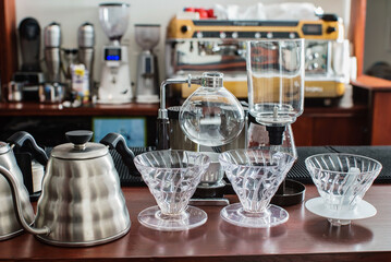 Devices for manual brewing in the background.