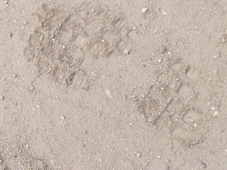 Footprint on ground as a background.