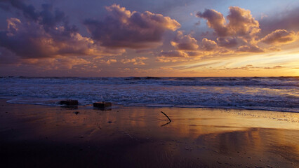 golden hour in versilia with sea clouds and sky