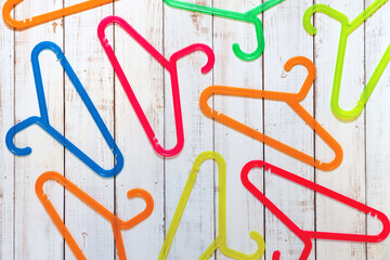  Colorful plastic hangers for children's clothing, discounts and sale concept