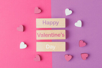 Blocks with words Happy Valentine’s day and decorative hearts. Valentine’s day greeting