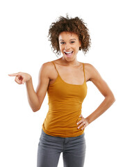 Studio shot of an attractive young woman pointing towards something Isolated on a PNG background.