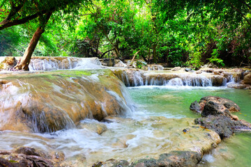 The atmosphere of a waterfall in a natural forest.