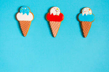 gingerbread in the form of ice cream on a blue background. High quality photo