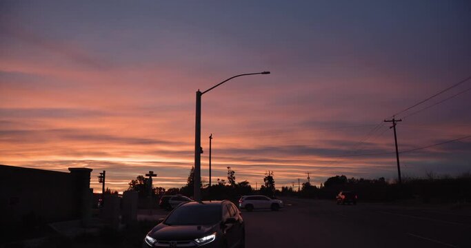 A pastel sky over a country road intersection after the rain in Clovis, CA, USA