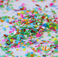 Fototapeta na wymiar Close up of colorful confetti on white background created using Generative AI technology