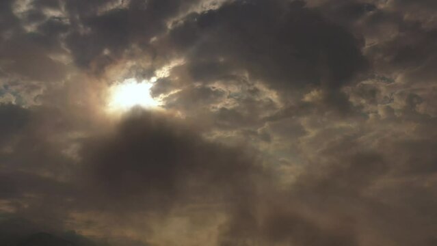 Dark clouds on sky.
Drone aerial view. 
Mountains. 