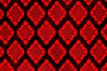 Fototapeta na wymiar Ceramic tiles with a red eastern pattern.
