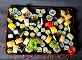 Sushi roll mix set with cheese, fish, salmon, caviar, Sesame , ginger.