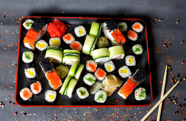 Sushi roll mix set with cheese, fish, salmon, caviar, Sesame , ginger.