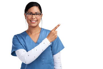 Portrait of a young doctor wearing glasses and scrubs, pointing to her left Isolated on a PNG background.