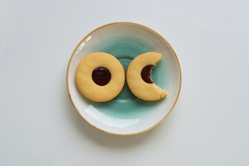 Biten cookie on the plate