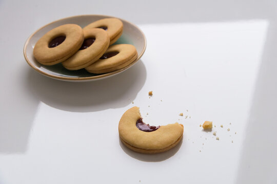Biten cookie on the plate