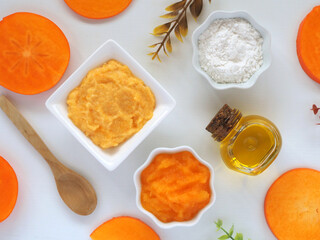 Natural cosmetics: persimmon (kaki) and rice flour face mask with olive oil