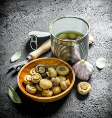 Canned mushrooms with garlic and Bay leaf.