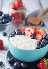 Milk rice with berries ready for breakfast