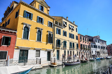 Fototapeta na wymiar Venice, Italy: Historical buildings along the river canal. Popular tourist destination.