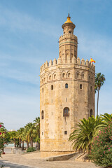 Fototapeta na wymiar Golden tower or Torre del Oro along the Guadalquivir river, Seville, Andalusia, Spain.