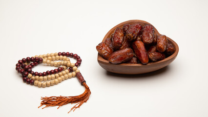 Ramadan food Sweets mixed of dried fruits, Dates premium dates, 
full of date fruits, Arabic coffee, Concept: month fasting culture Muslim prayer, 
1444 Puasa Ramadan Kareem greeting festival
