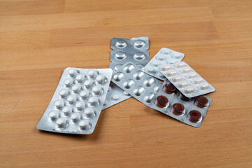 Blisters of pills on the table.