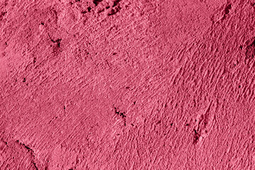 Viva Magenta. Color of the year 2023. Toned Photo of natural concrete old wall texture. Cement surface. Horizontal. Abstract empty background.