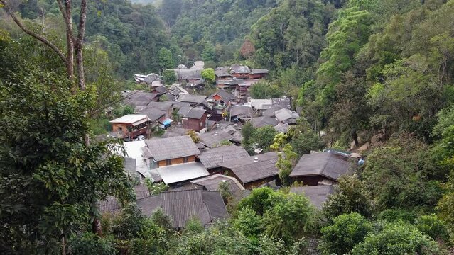 Beautiful view of Ban Mae Kampong village surrounded by evergreen forest, a peaceful village in Mae On sub-district, Chiang Mai, northern Thailand